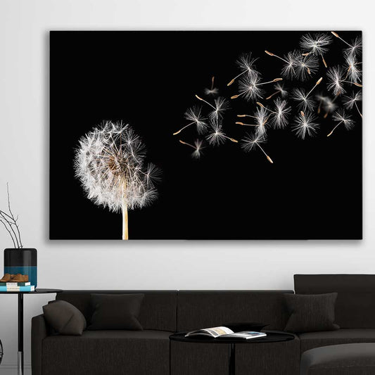Floral print of Blowing Dandelion on a stretched canvas displayed in a room