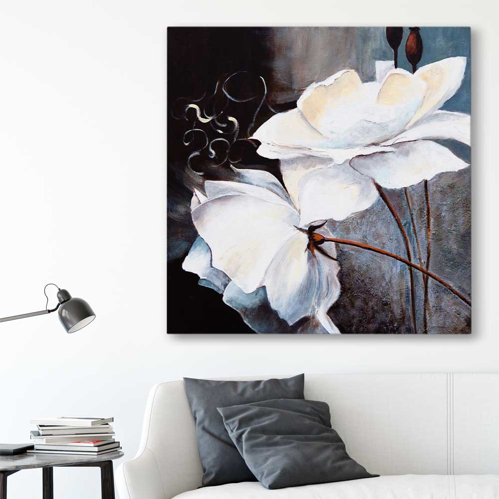 Floral print of Calming White Flowers on a stretched canvas displayed in a room
