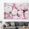 Floral print of Delicate Peonies on a stretched canvas displayed in a room