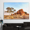 Floral print of Devils Marbles on a stretched canvas displayed in a room