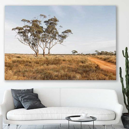 Floral print of Grassy Tufts on a stretched canvas displayed in a room