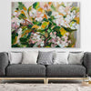Floral print of Green Blossom on a stretched canvas displayed in a room