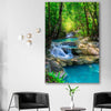 Floral print of Tropical Thailand Waterfall on a stretched canvas displayed in a room
