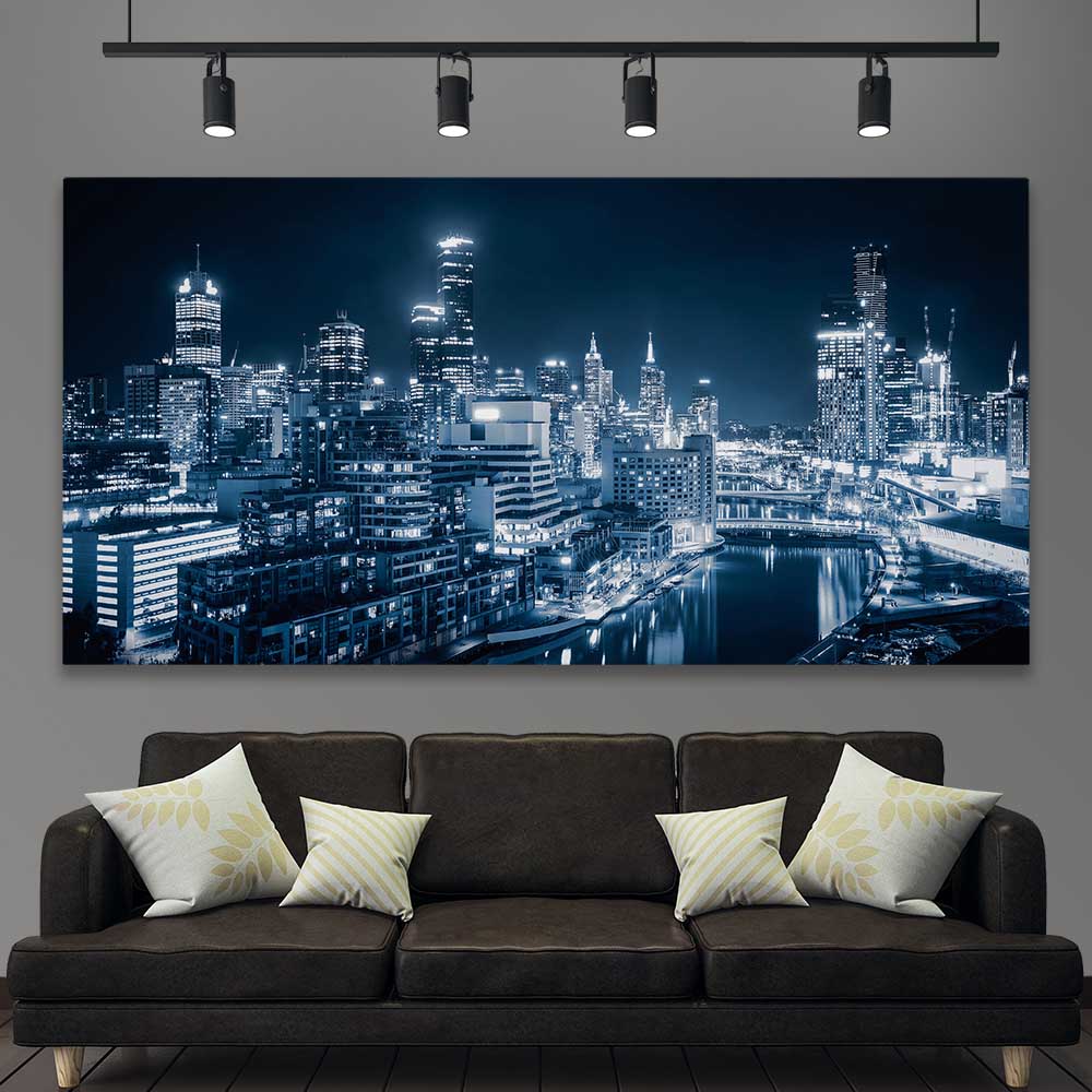 Melbourne City Glow stretched canvas displayed in a room is a high quality print in our city skyline, travel prints and maps collection