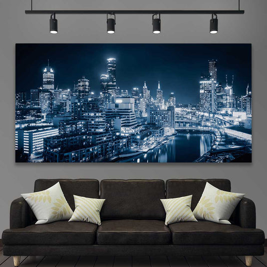 Melbourne City Glow stretched canvas displayed in a room is a high quality print in our city skyline, travel prints and maps collection