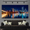 Perth Skyline Glow stretched canvas displayed in a room is a high quality print in our city skyline, travel prints and maps collection
