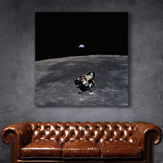 Space prints and wall art of Apollo 11 Earthrise on a stretched canvas displayed in a room