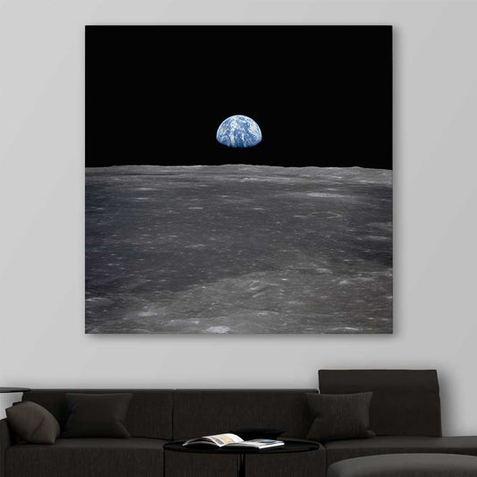 Space prints and wall art of Earthrise on a stretched canvas displayed in a room