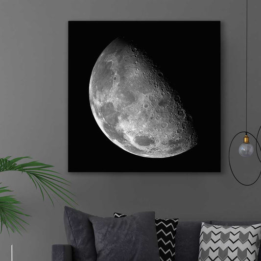 Space prints and wall art of The Moon on a stretched canvas displayed in a room