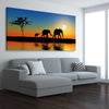 Animal wall art and canvas prints of Elephant Family on a stretched canvas displayed from an angle in a room
