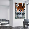 Animal wall art and canvas prints of Golden Tiger Gaze on a stretched canvas displayed from an angle in a room