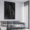 Animal wall art and canvas prints of Midnight Friesian Horse on a stretched canvas displayed from an angle in a room