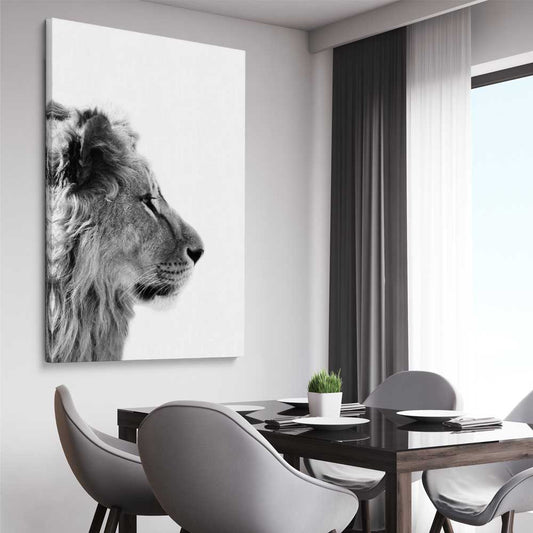 Animal wall art and canvas prints of Pondering Lion on a stretched canvas displayed from an angle in a room
