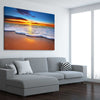 Beach and coastal wall art print of Radiant Ocean Sunset on a stretched canvas displayed from an angle in a room