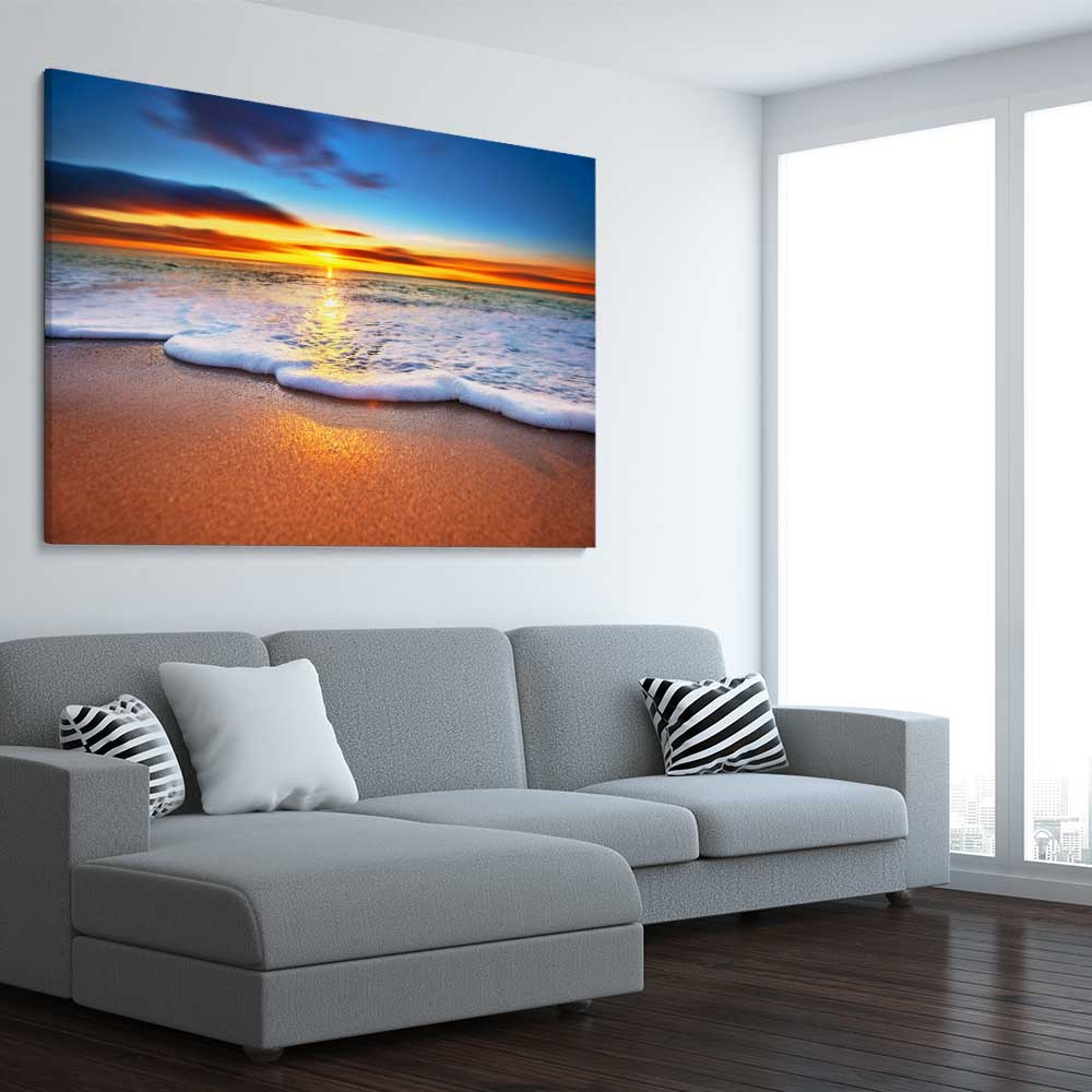 Beach and coastal wall art print of Radiant Ocean Sunset on a stretched canvas displayed from an angle in a room