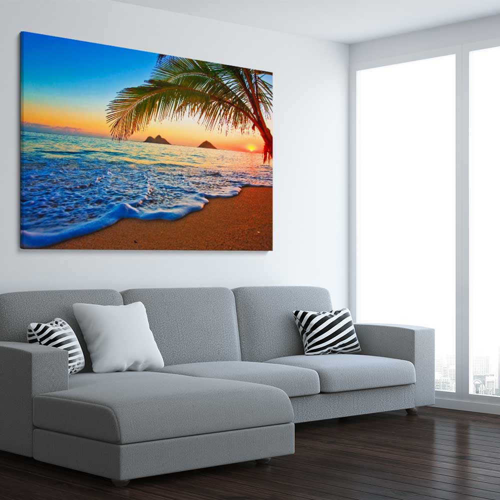 Beach and coastal wall art print of Tropical Sunset Shore on a stretched canvas displayed from an angle in a room