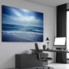 Beach and coastal wall art print of Beach Solitude on a stretched canvas displayed from an angle in a room