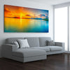 Beach and coastal wall art print of Beautiful Sunset on a stretched canvas displayed from an angle in a room