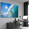 Beach and coastal wall art print of Blue Ocean Surfer on a stretched canvas displayed from an angle in a room