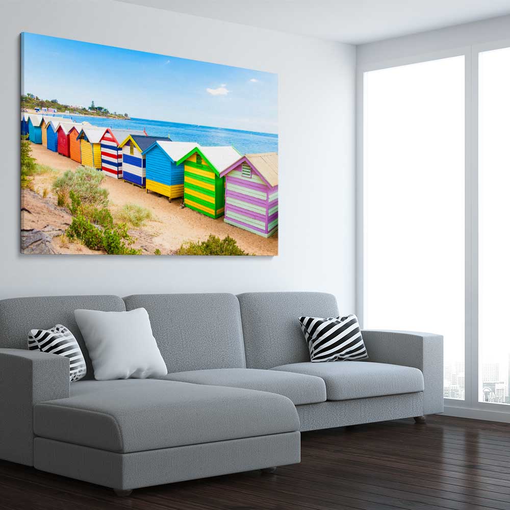 Beach and coastal wall art print of Brighton Beach Australia on a stretched canvas displayed from an angle in a room