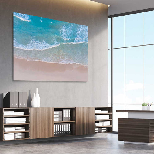 Beach and coastal wall art print of Calm Waves on a stretched canvas displayed from an angle in a room