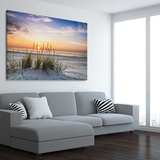 Beach and coastal wall art print of Calming Sunset on a stretched canvas displayed from an angle in a room
