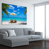 Beach and coastal wall art print of Coastal Retreat on a stretched canvas displayed from an angle in a room