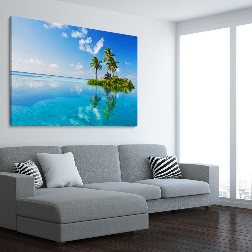 Beach and coastal wall art print of Island Serenity on a stretched canvas displayed from an angle in a room