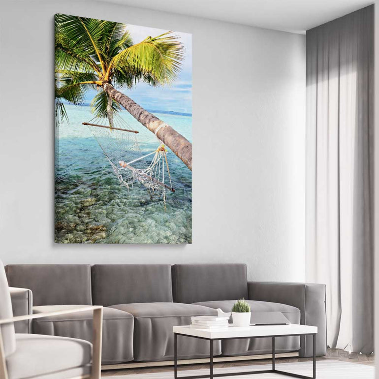 Beach and coastal wall art print of Maldives Hammock on a stretched canvas displayed from an angle in a room