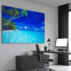 Beach and coastal wall art print of Paradise Shore on a stretched canvas displayed from an angle in a room