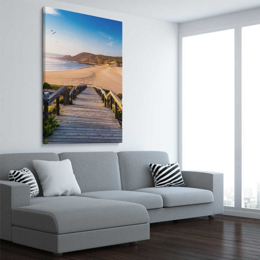 Beach and coastal wall art print of Paradise Walkway on a stretched canvas displayed from an angle in a room