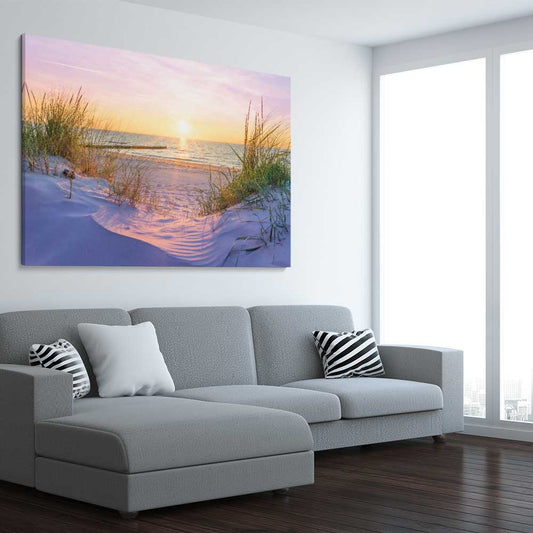 Beach and coastal wall art print of Pristine Beach Sunset on a stretched canvas displayed from an angle in a room