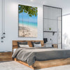 Beach and coastal wall art print of Pristine Beach Swing on a stretched canvas displayed from an angle in a room