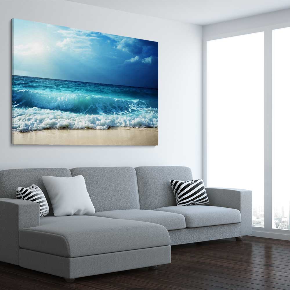 Beach and coastal wall art print of Seychelles Beach Waves on a stretched canvas displayed from an angle in a room