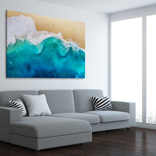 Beach and coastal wall art print of Summer Waves on a stretched canvas displayed from an angle in a room