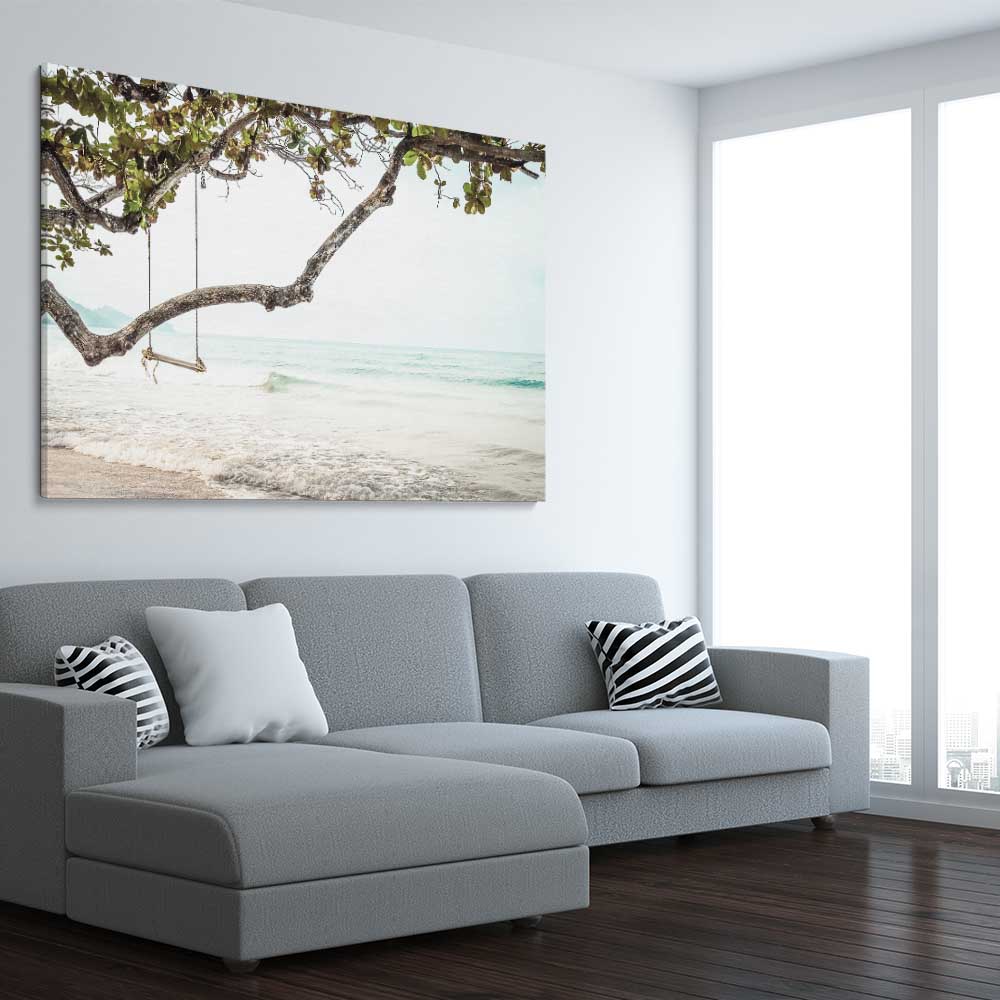 Beach and coastal wall art print of Tropical Beach on a stretched canvas displayed from an angle in a room