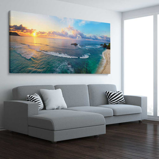 Beach and coastal wall art print of Tropical Surfers Beach on a stretched canvas displayed from an angle in a room