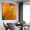 Classic wall art and canvas print of Adele Bloch-Bauer I Gustav Klimt on a stretched canvas displayed from an angle in a room