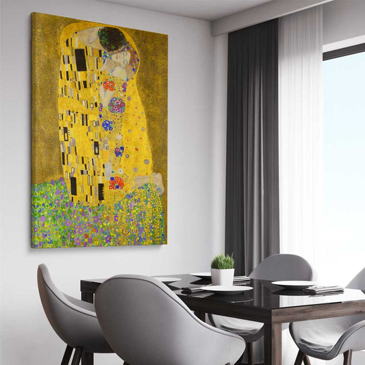 Classic wall art and canvas print of The Kiss Gustav Klimt on a stretched canvas displayed from an angle in a room