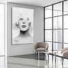 Feather Lips stretched canvas displayed from an angle in a room - part of our high quality fashion canvas wall art and prints collection