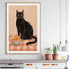 Black Cat and Peaches stretched canvas displayed from an angle in a room is a colourful and stylish canvas wall art and print suited for the kitchen area