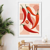 Scarlet Chilli Rhythm stretched canvas displayed from an angle in a room is a colourful and stylish canvas wall art and print suited for the kitchen area