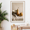 Tuscan Pears stretched canvas displayed from an angle in a room is a colourful and stylish canvas wall art and print suited for the kitchen area