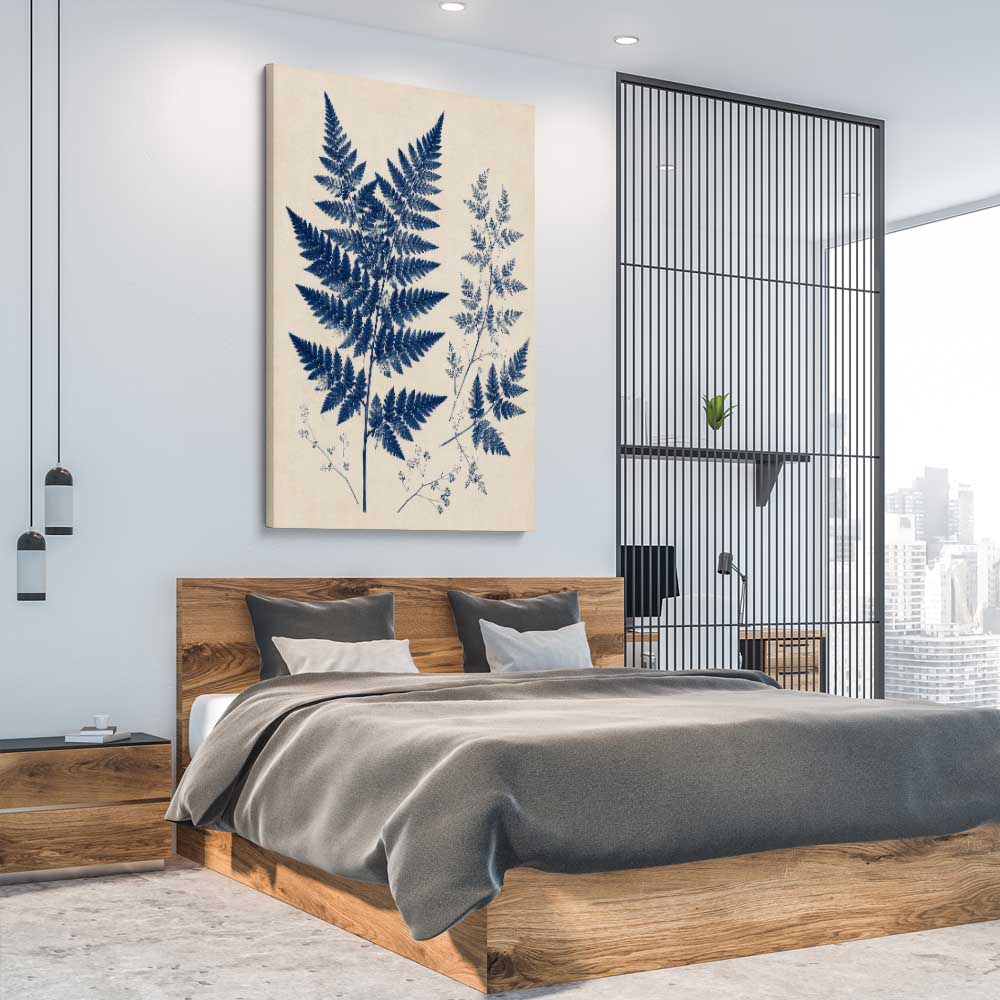 Floral print of Indigo Fern on a stretched canvas displayed from an angle in a room