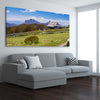 Floral print of Victorian Alps Craigs Hut on a stretched canvas displayed from an angle in a room
