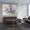 Floral print of Beautiful Sakura Flowers on a stretched canvas displayed from an angle in a room