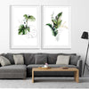 Floral print of Botanic Gold Pair on a stretched canvas displayed from an angle in a room