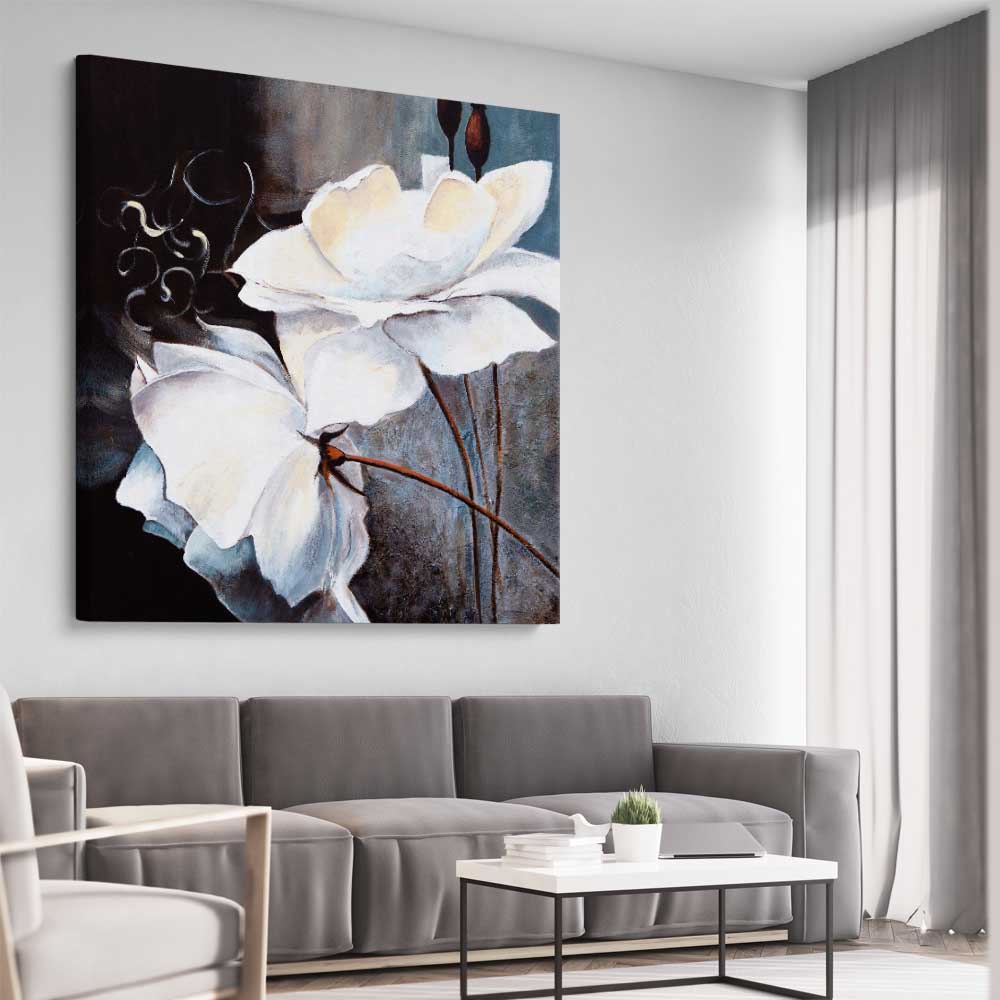 Floral print of Calming White Flowers on a stretched canvas displayed from an angle in a room
