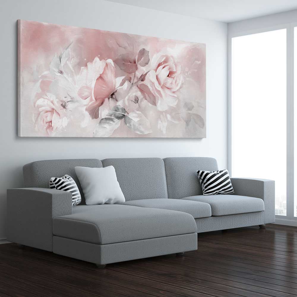 Floral print of Delicate Pink Rose on a stretched canvas displayed from an angle in a room