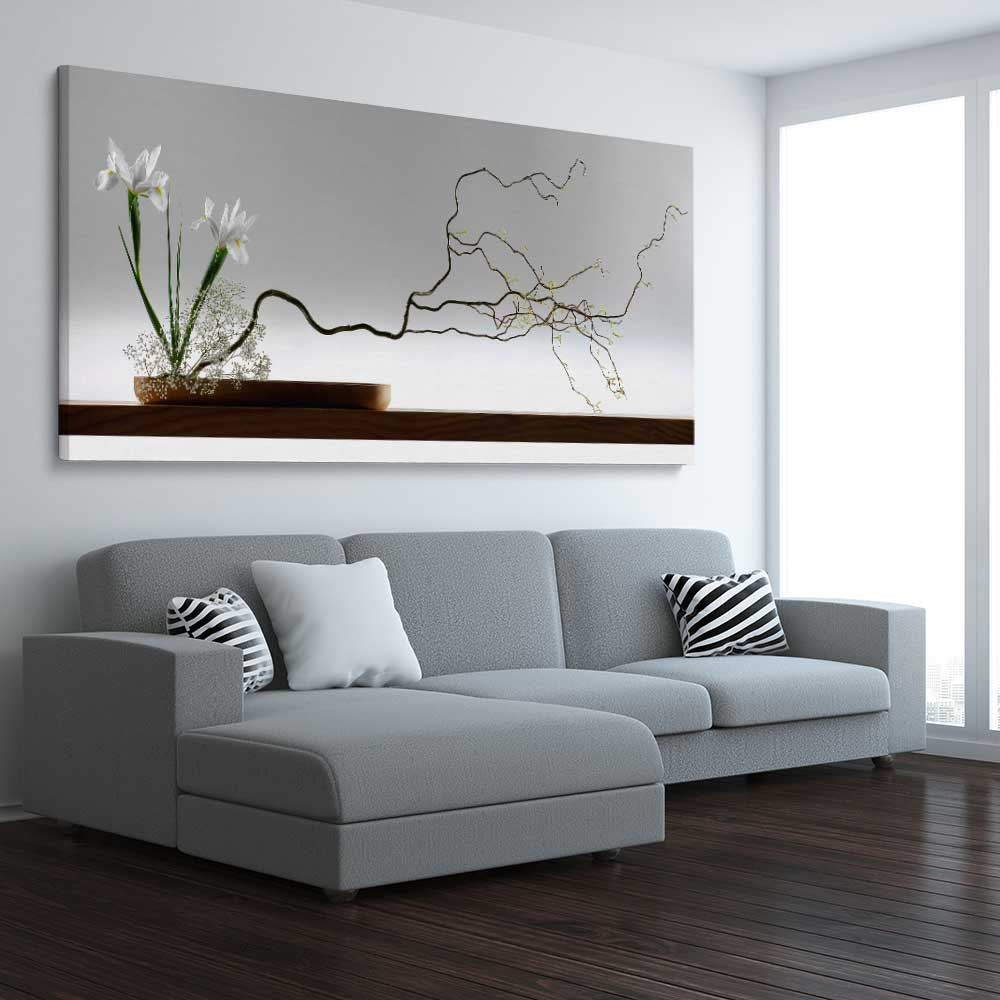 Floral print of Growing Ikebana on a stretched canvas displayed from an angle in a room